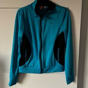 Puma women’s light weight warmup jacket. Size medium. Blue.